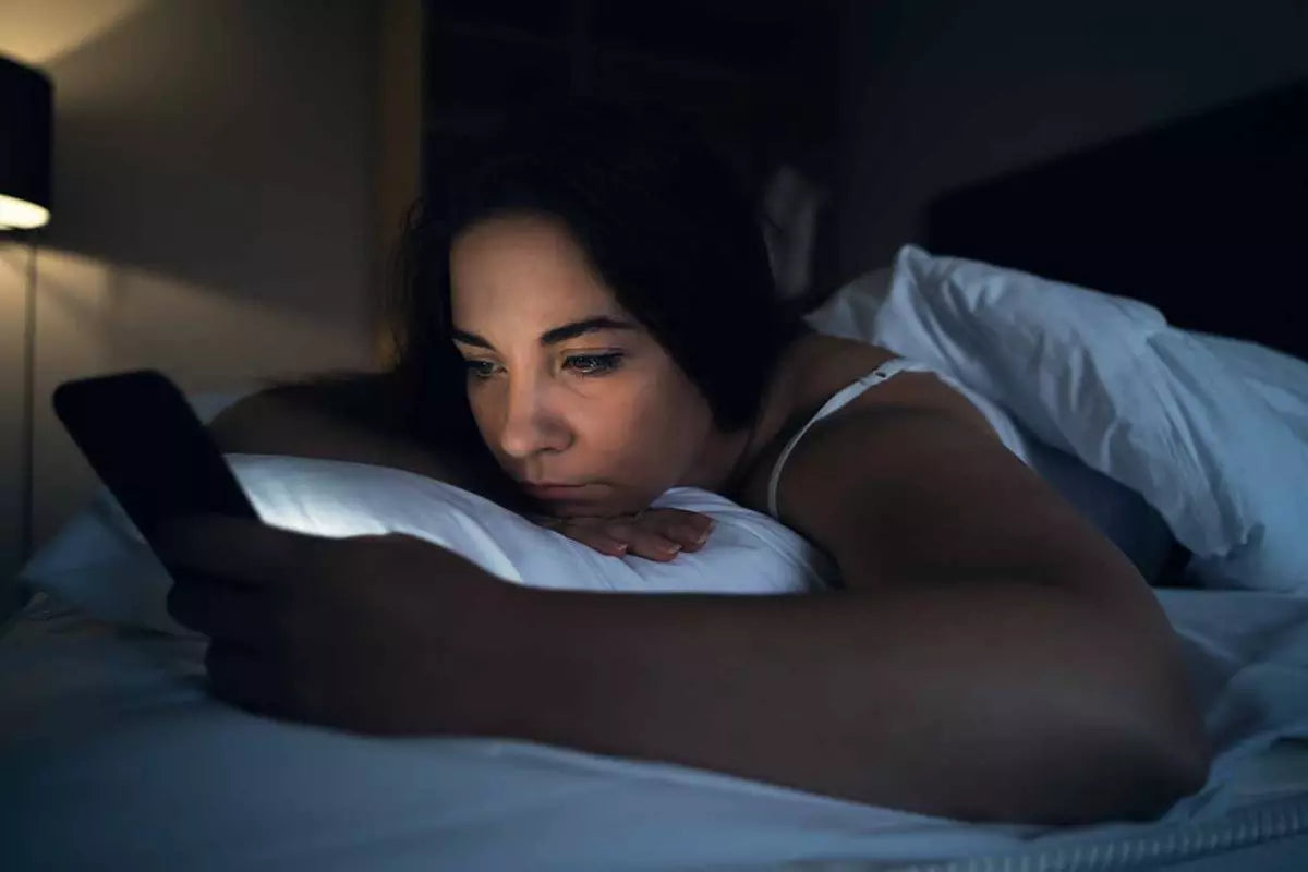 Feeling Wired But Tired? Here’s How to Actually Quiet Your Busy Brain and Sleep Better